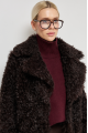 Curly double-sided chocolate-colored sheepskin coat made of natural sheepskin